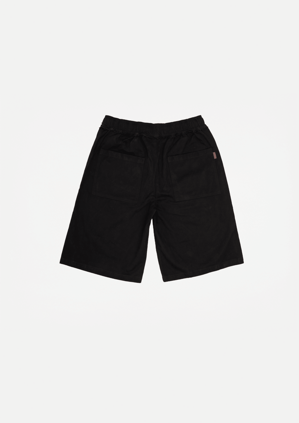 Black raw-edge canvas shorts with drawstring waist and loose fit